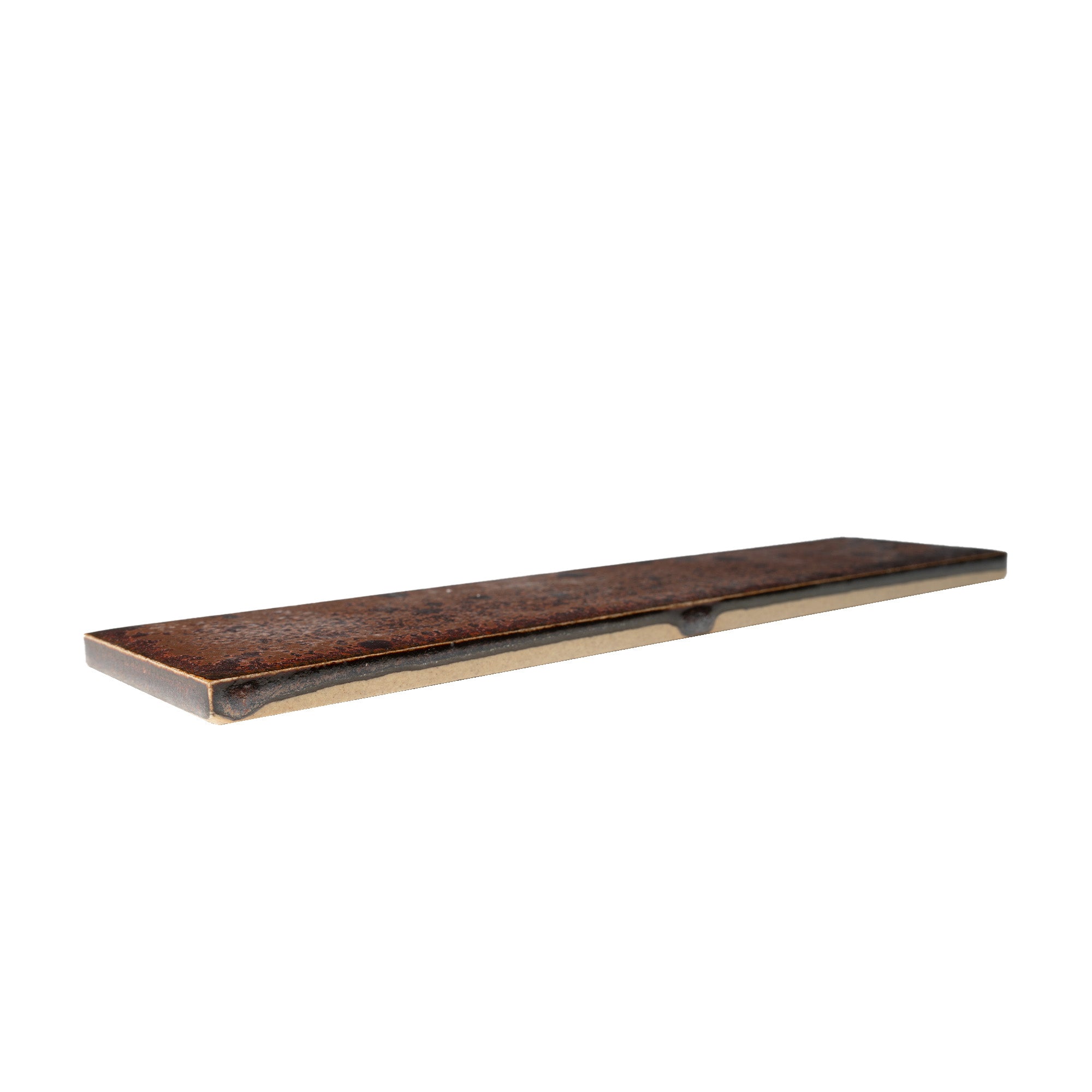 Rusty Red Glazed Porcelain Tile 2x8 — side view showing tile thickness