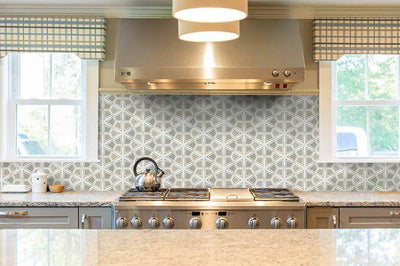 Perfect for backsplashes, bathrooms, or brilliant accent walls, these little encaustic tiles sure do pack a design punch!