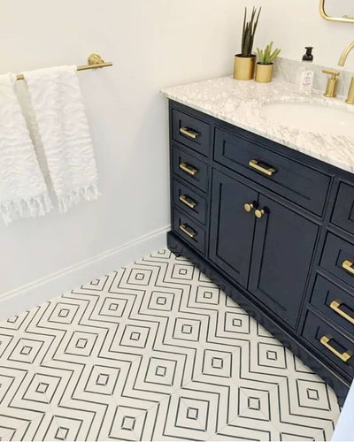 These chevron-striped Mia 4 cement tiles are perfect for backsplashes, accent walls, and stunning floors.